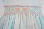 Load image into Gallery viewer, Mint Green Smocked Baby Dress – hand embroidered Classic Piqué Cotton with Side hair Bow