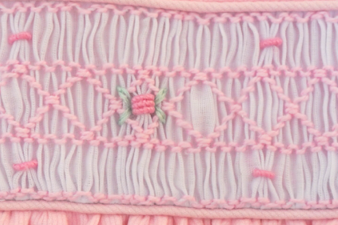 Pink Smocked Girls Dress – Classic Elegance for Babies and toddlers With bloomer and head bow