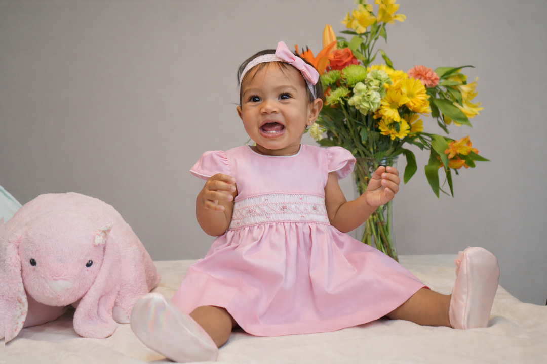 Pink Smocked Girls Dress – Classic Elegance for Babies and toddlers With bloomer and head bow