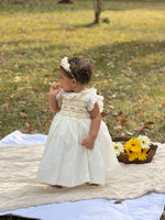 Load image into Gallery viewer, Cream Smocked baby girl Dress – Soft Cotton Elegance Size 12-24M