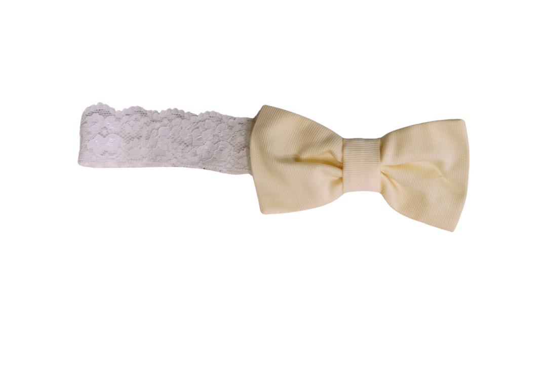 Yellow Baby girl Smocked romper. Hand embroidered with Hair Bow