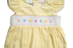 Load image into Gallery viewer, Yellow Baby girl Smocked romper. Hand embroidered with Hair Bow