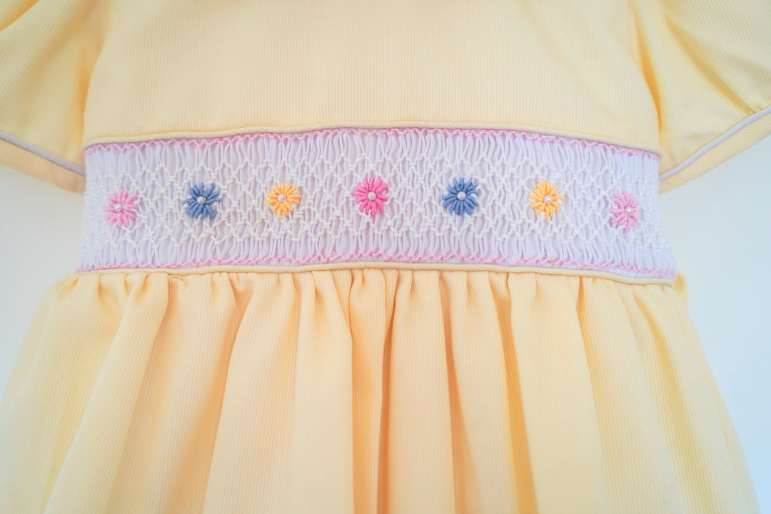 Yellow Smocked and hand embroidered Baby Girl Dress with Bow